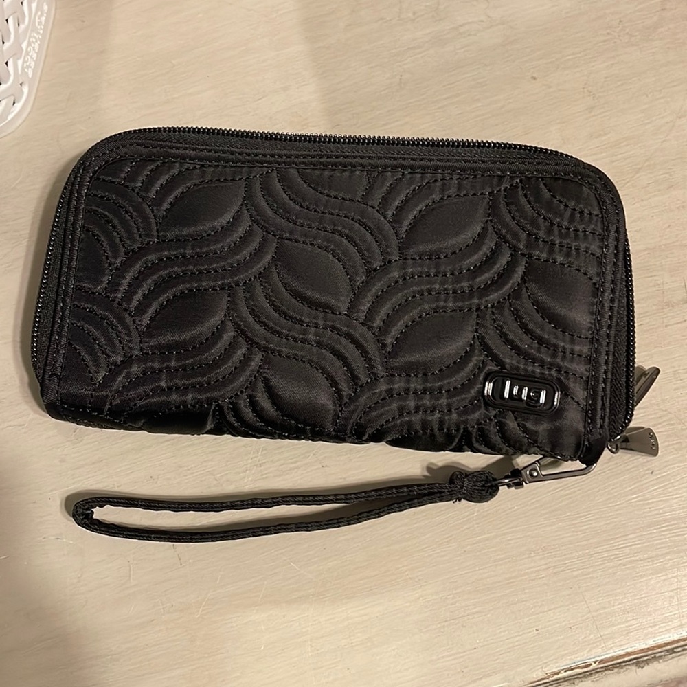 Lug zip around wallet wristlet.